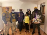 Grateful Family receiving Thanksgiving Basket